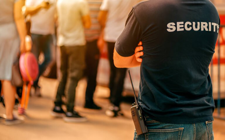 Security guard from Trans World Security Services Ltd. on duty in New Westminster, monitoring a commercial property